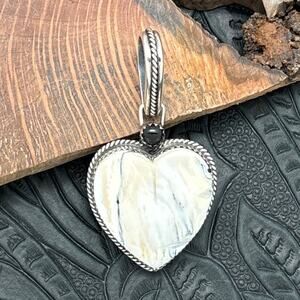 BUFFALO DANCER Taos Pueblo Sterling Silver White Buffalo Heart Pendant With Onyx